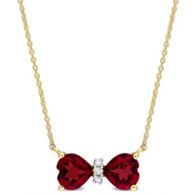 Belk & Co 1 Ct. T.g.w. Garnet And Diamond Accent Bow Necklace In 10K Yellow Gold