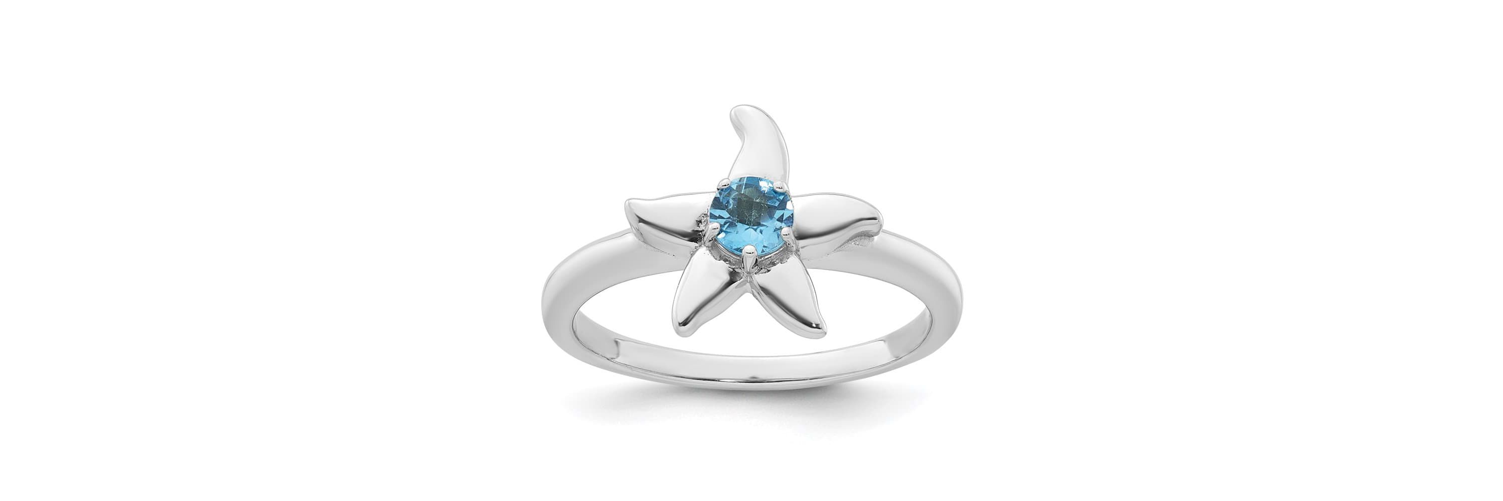 1/4 ct. t.w. Blue Topaz Polished Starfish Ring in Rhodium-plated Sterling Silver