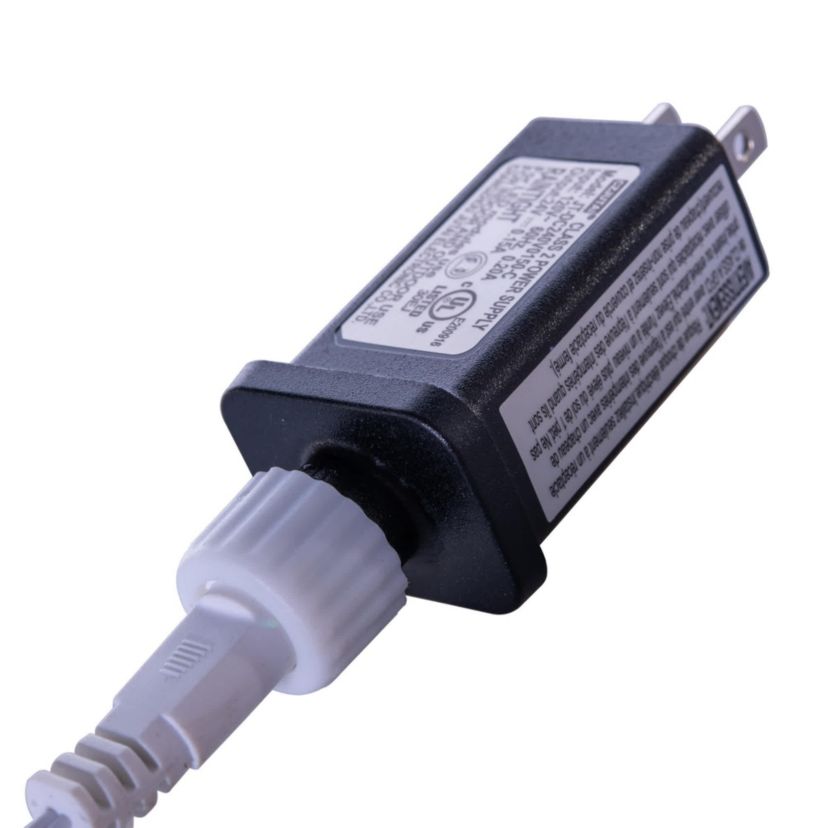 Vickerman 6 White Icy Sugar Glitter Twig Tree 128WW LED. White Icy Sugar and Iridescent Glitter Twig Tree with 128 Warm White LED 3mm Wide Angle LED Lights. Flexible branches. White wire color. Non-replaceable bulbs. Coaxial Plug Power cord with 16.5 foot lead length. UL/IP44/24V/DC/3.6VA transformer