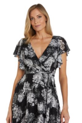 Black Ground Floral Print W Mock Wrap Bodice  Tie Waist Flutter Sleeves And Hanky Hem