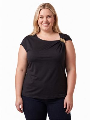 24seven Comfort Apparel Women's Elevate Curvy Cap Sleeve Asymmetrical Boat Neck With Gold Shoulder Brooch Top, Black, 3XL