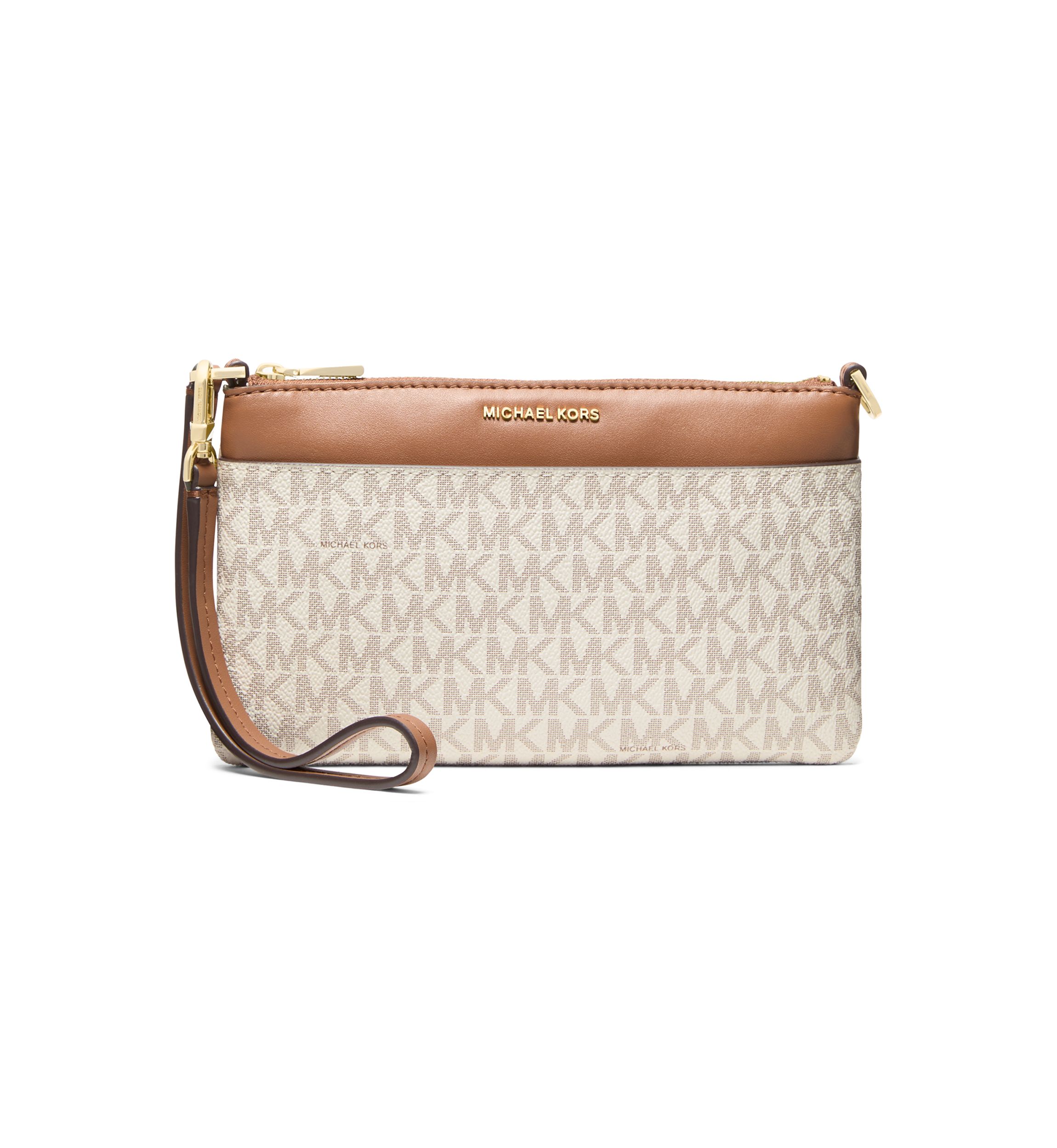 Jet Set Medium Top Zip Convertible Wristlet 