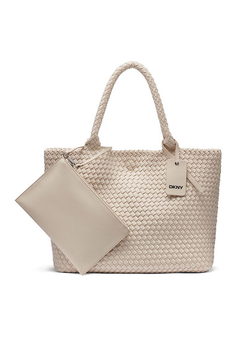 cool travel tote bags 16 Best Travel Totes to Make Your Summer Getaway a Total Breeze