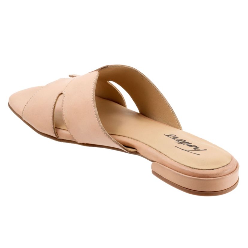 Cut outs give the Nell sandal a unique and fun style youll love. With a leather upper and soft leather lining, youll love the luxurious feel of the Nell sandal.