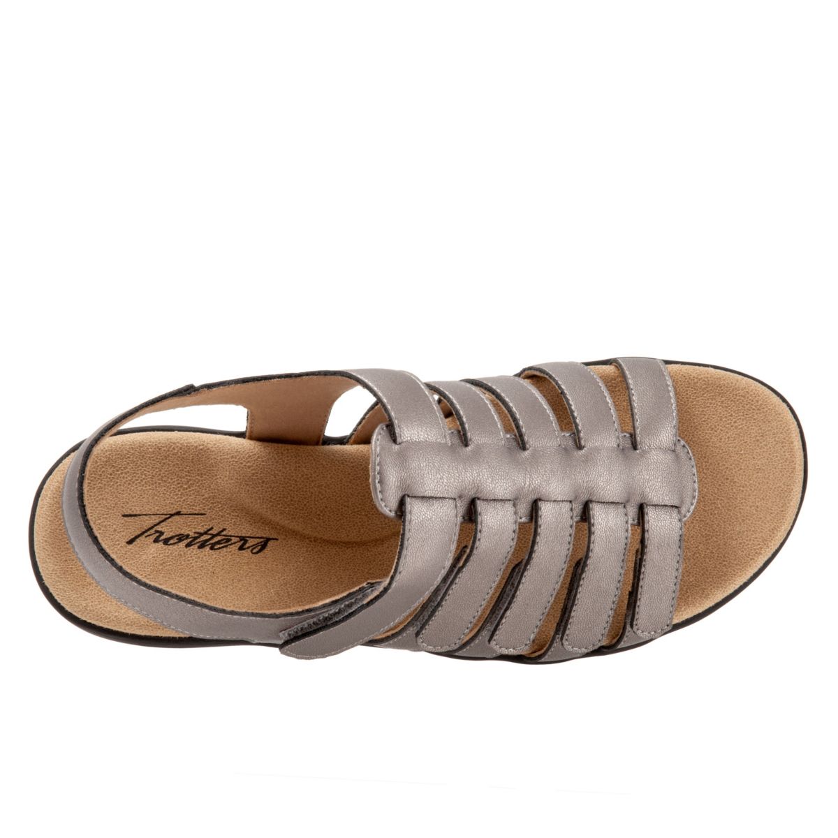 Five-point adjustability in flattering slim straps enhance the perfected fit of the Tiki, a fisherman-inspired sandal. Featured in embossed nubucks and statement making snake print, this will be your go to summer staple.