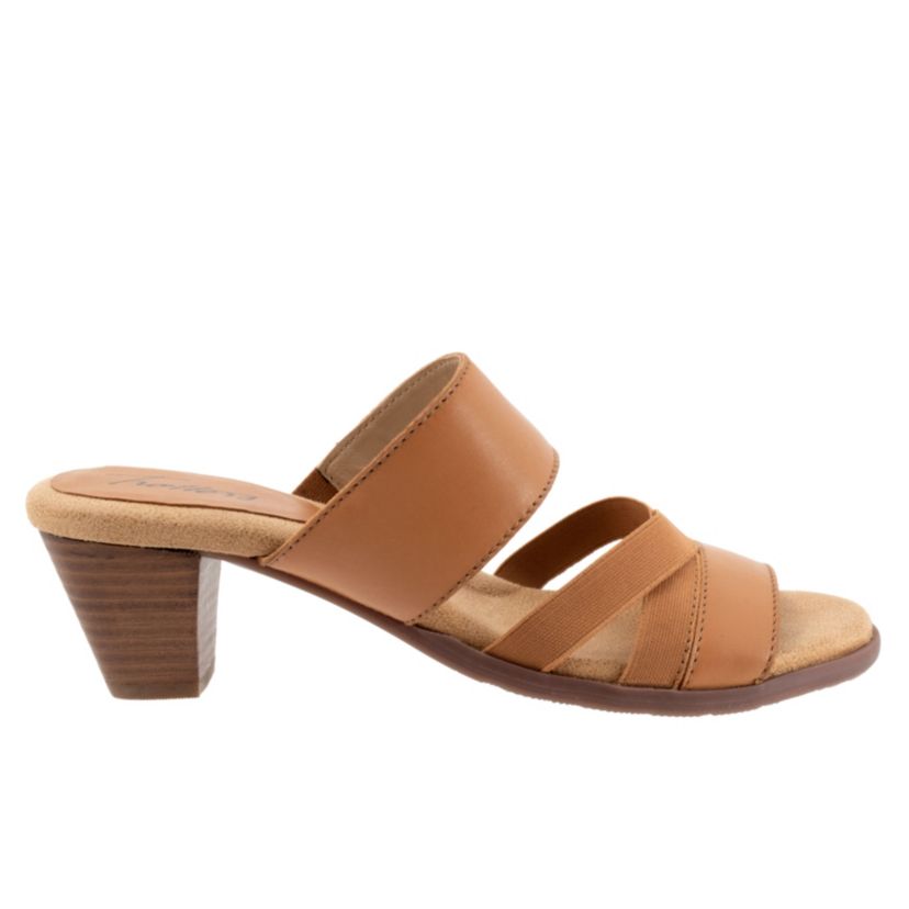 The Maxine has crossing stretch straps as well as an elastic v-gore for a comfortable fit. Maxines easygoing style and stacked heel keeps thing playful and chic.