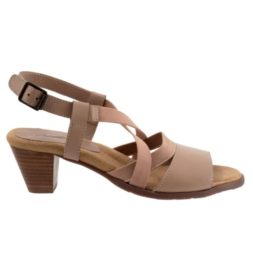 The Maxine has crossing stretch straps as well as an elastic v-gore for a comfortable fit. Maxines easygoing style and stacked heel keeps thing playful and chic.