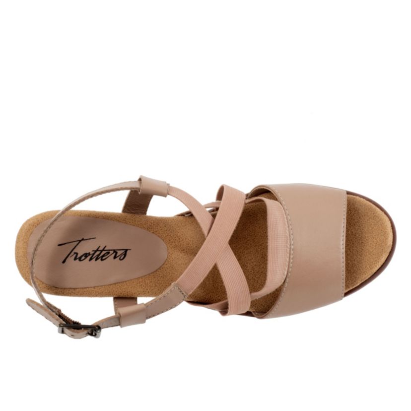 The Maxine has crossing stretch straps as well as an elastic v-gore for a comfortable fit. Maxines easygoing style and stacked heel keeps thing playful and chic.