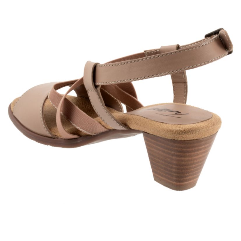 The Maxine has crossing stretch straps as well as an elastic v-gore for a comfortable fit. Maxines easygoing style and stacked heel keeps thing playful and chic.