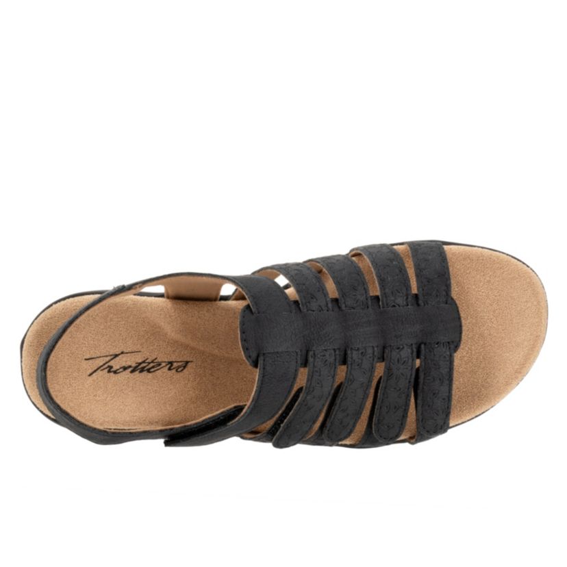 The Tiki Tool takes the Tiki sandal another direction with a beautiful floral pattern embossed on the straps. A memory foam cushioned and contoured footbed with arch support provides all day comfort and all of the straps are adjustable to fit you.