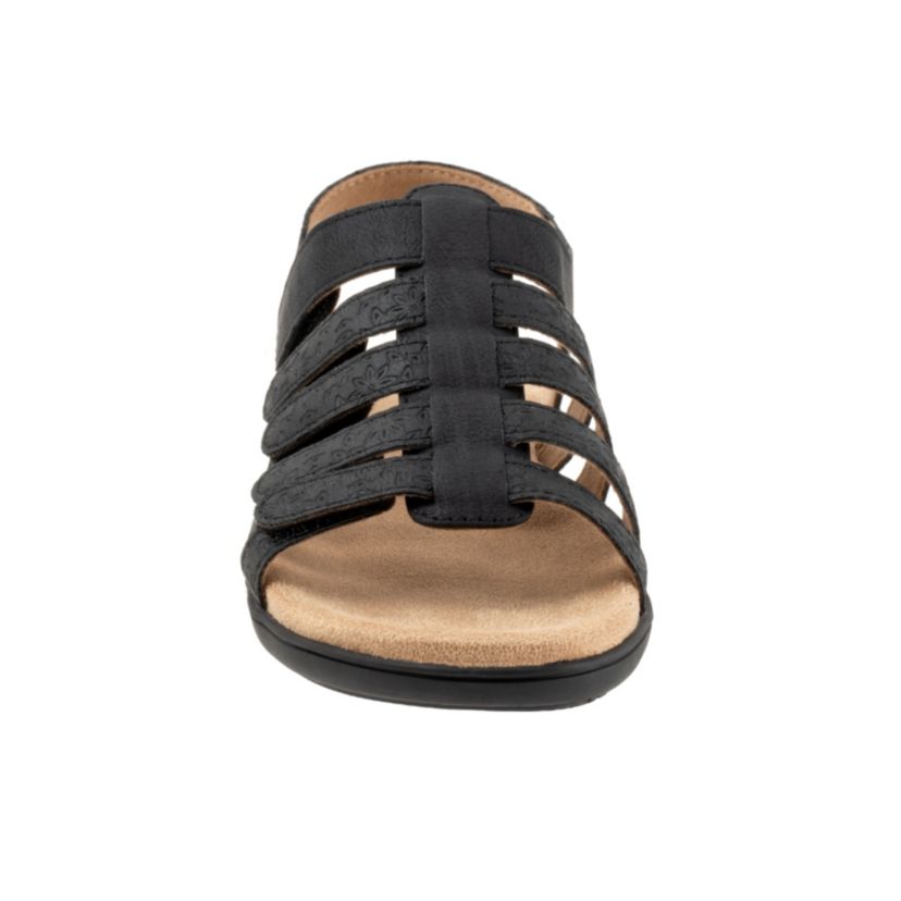 The Tiki Tool takes the Tiki sandal another direction with a beautiful floral pattern embossed on the straps. A memory foam cushioned and contoured footbed with arch support provides all day comfort and all of the straps are adjustable to fit you.