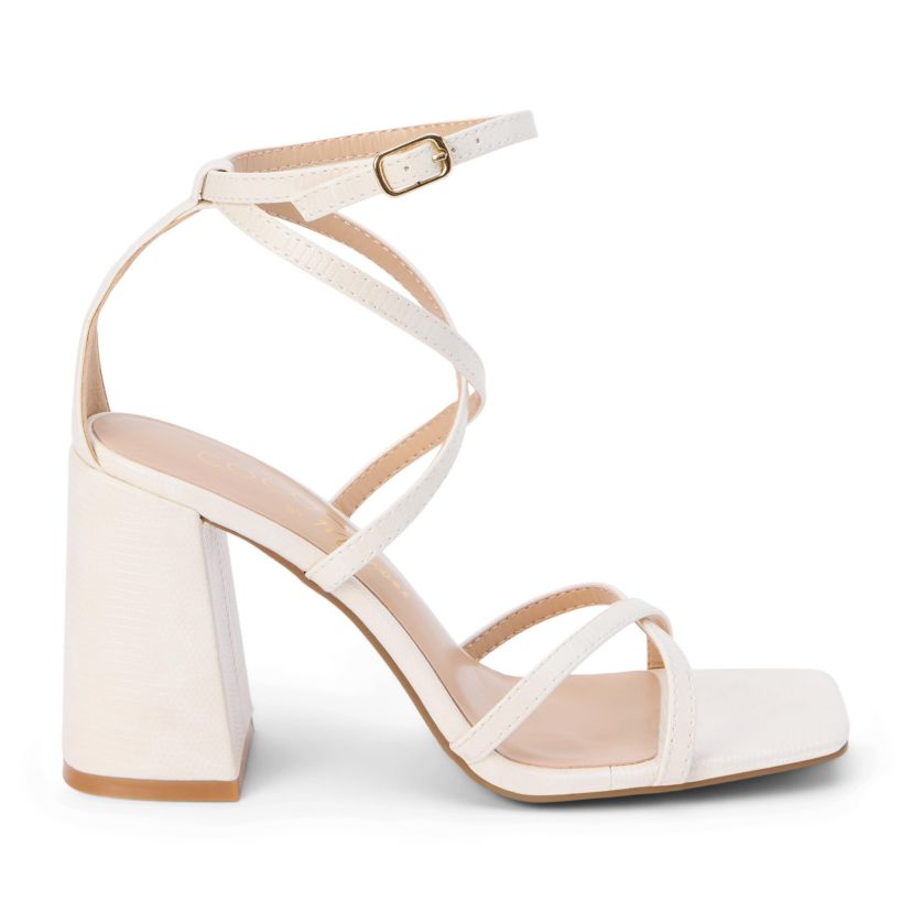 Vegan, strappy sandal on a block heel.