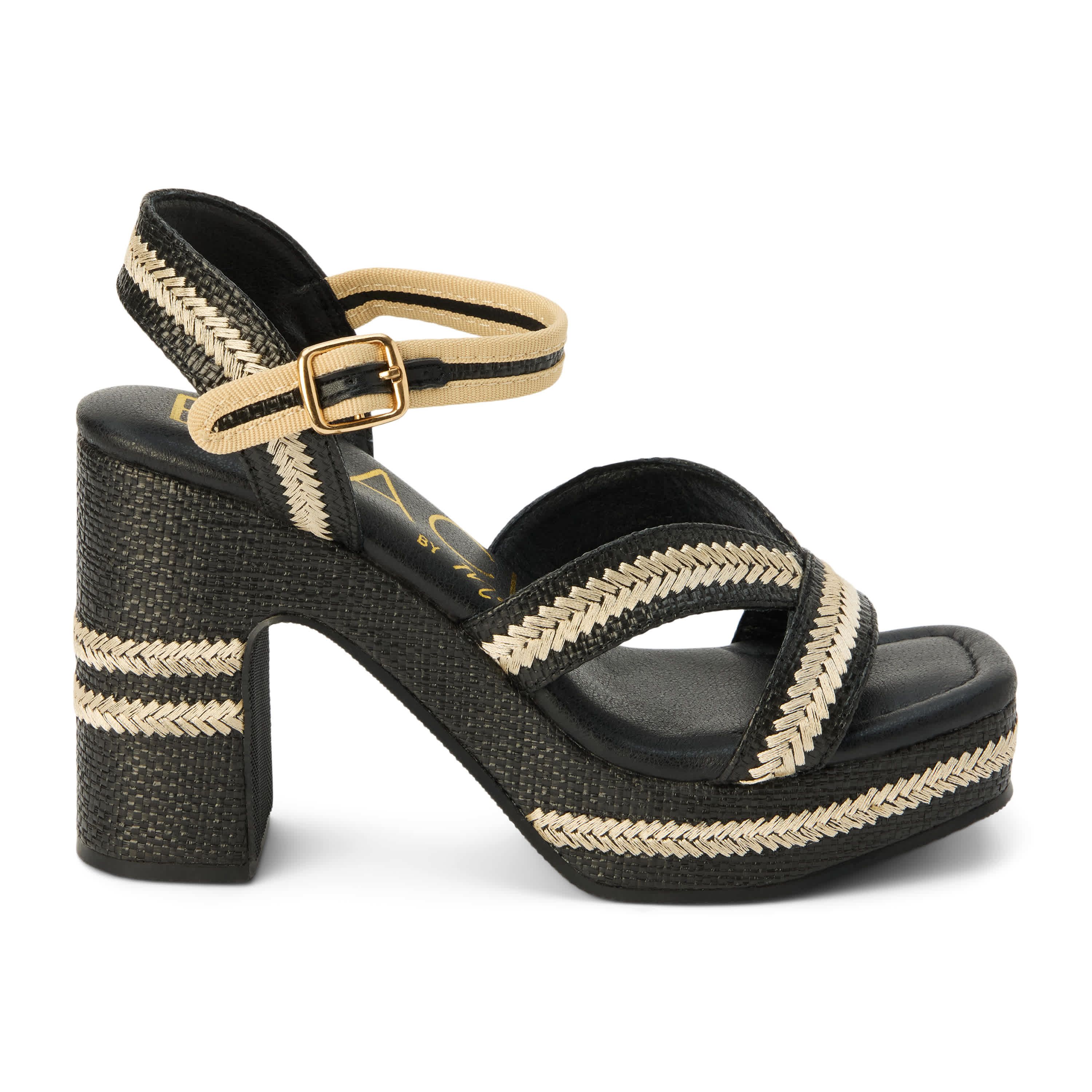 Vegan, platformed heeled sandal with ankel strap.