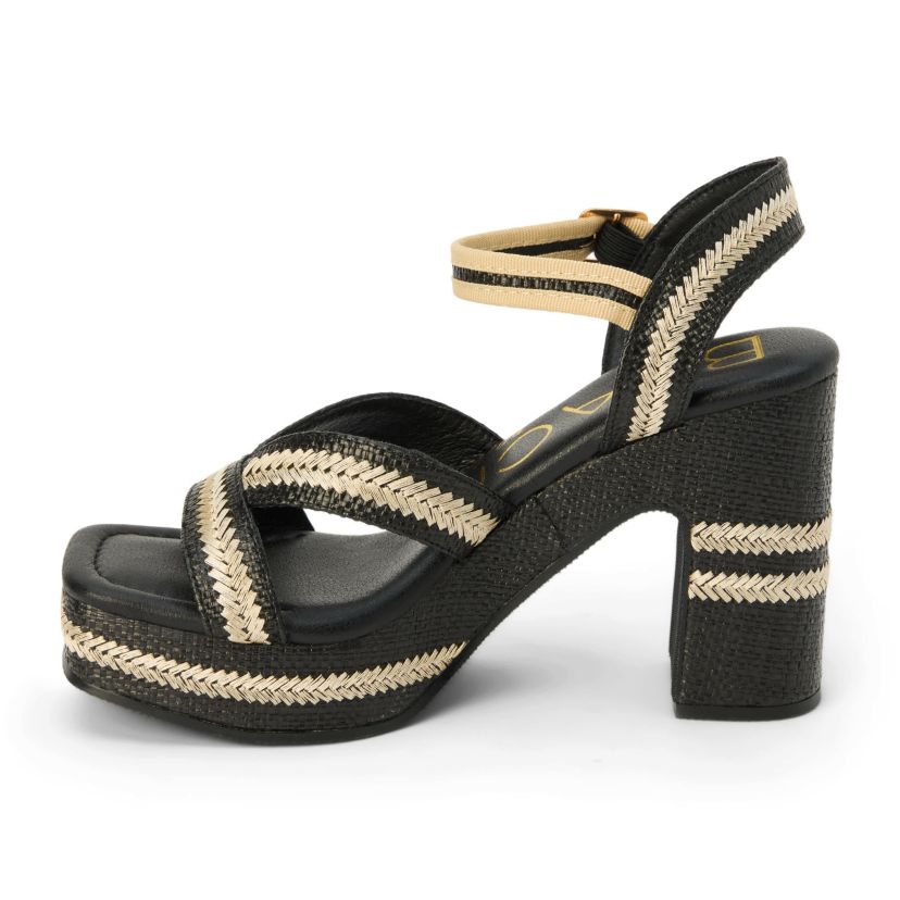 Vegan, platformed heeled sandal with ankel strap.
