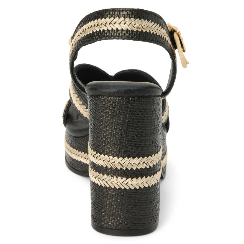 Vegan, platformed heeled sandal with ankel strap.