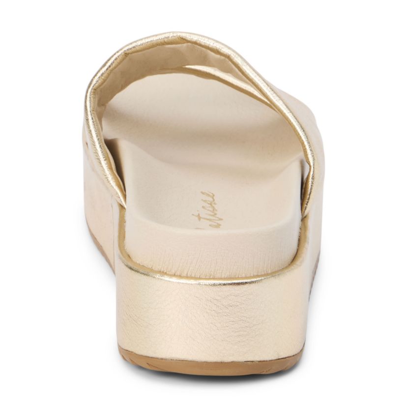 Platform sandal with two asymmetrical straps.