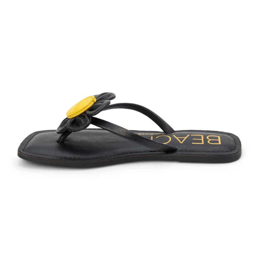 Square toe flip flop sandal with flower appliqué.