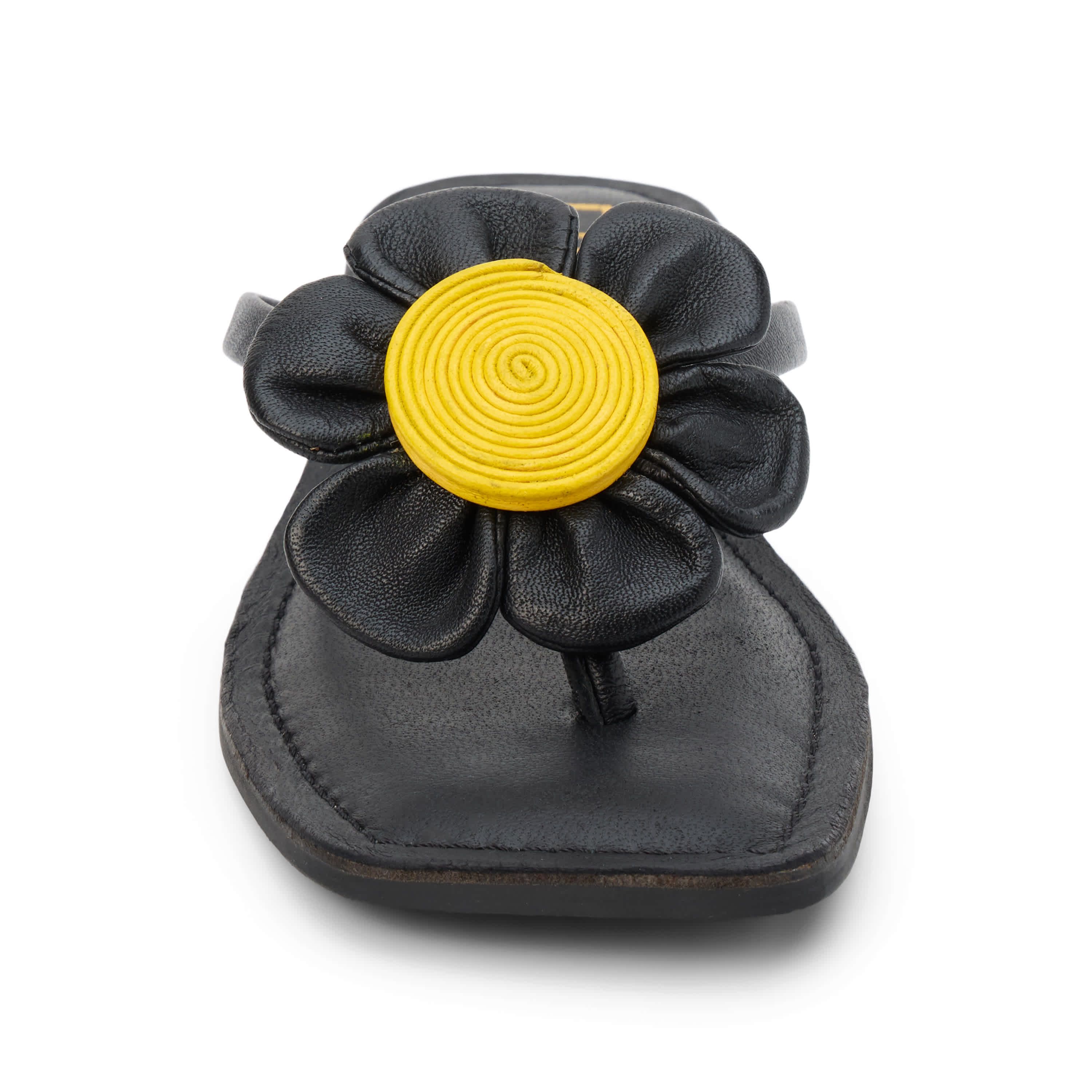 Square toe flip flop sandal with flower appliqué.