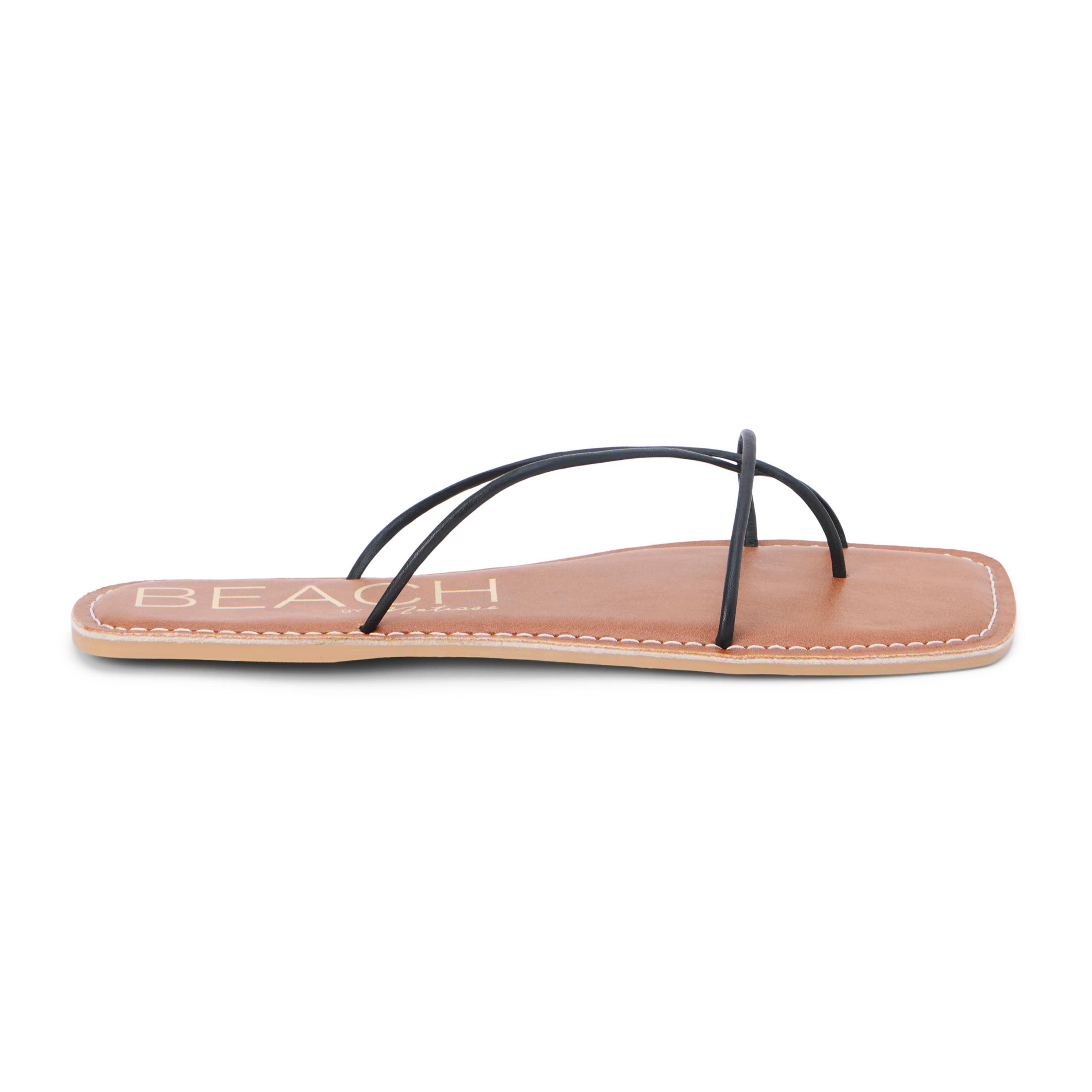 Strappy flat sandal.