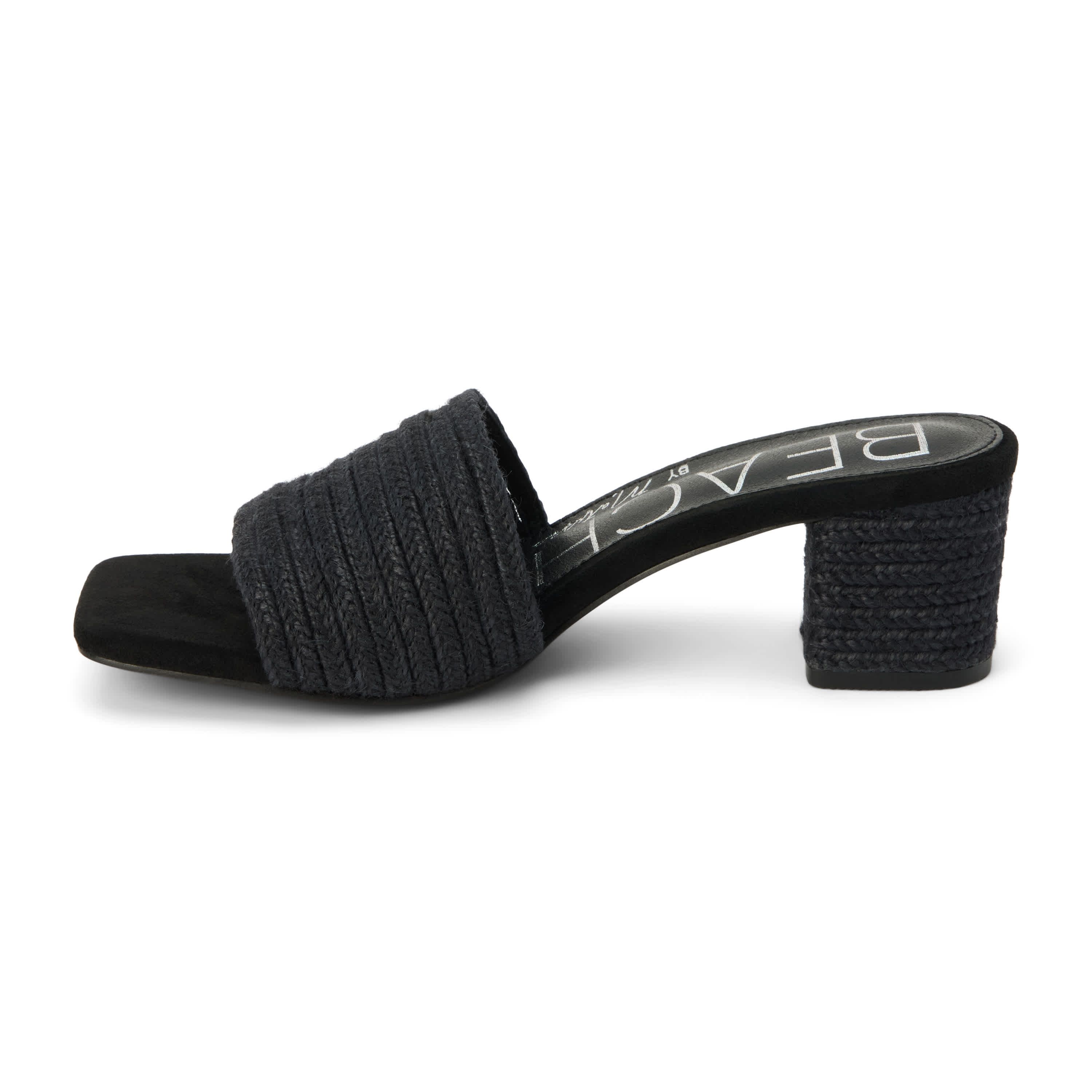 Vegan strappy one band heeled sandal.