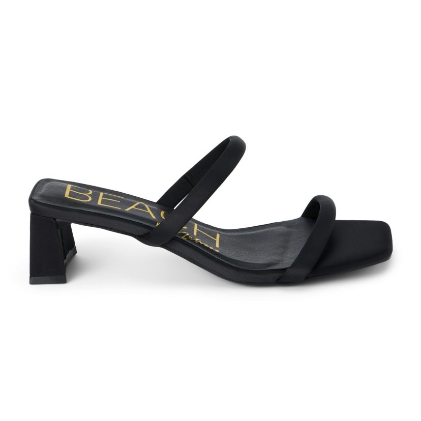 Vegan two-band sandal on slender block heel.