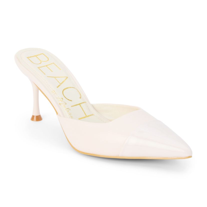 Vegan pointed toe mule on architectural heel.