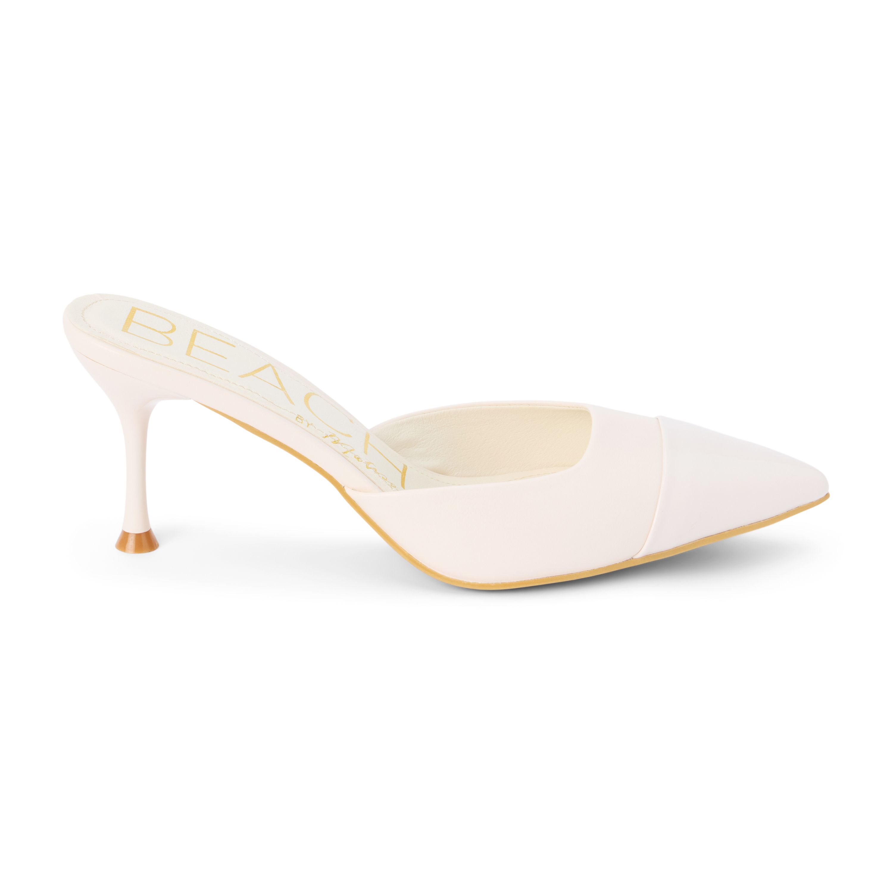 Vegan pointed toe mule on architectural heel.