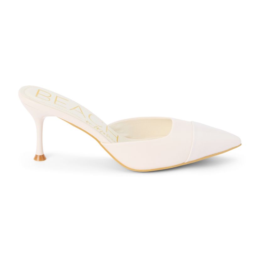 Vegan pointed toe mule on architectural heel.