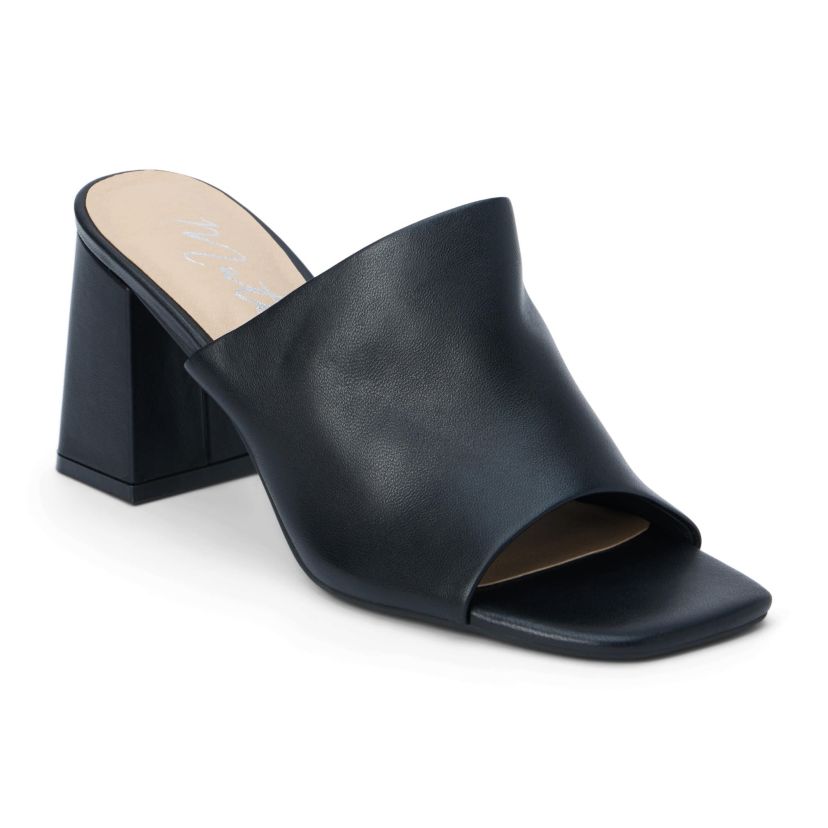 Block heeled sandal with unstructured upper.