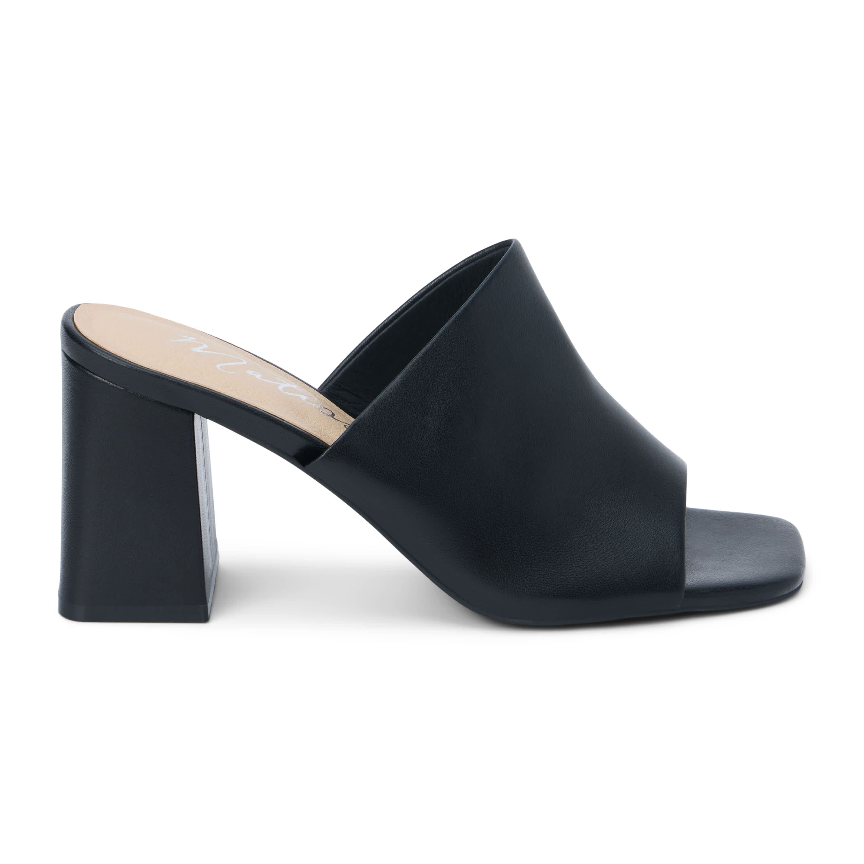 Block heeled sandal with unstructured upper.