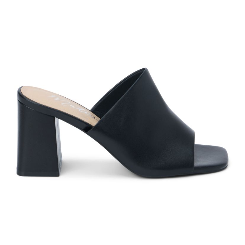 Block heeled sandal with unstructured upper.