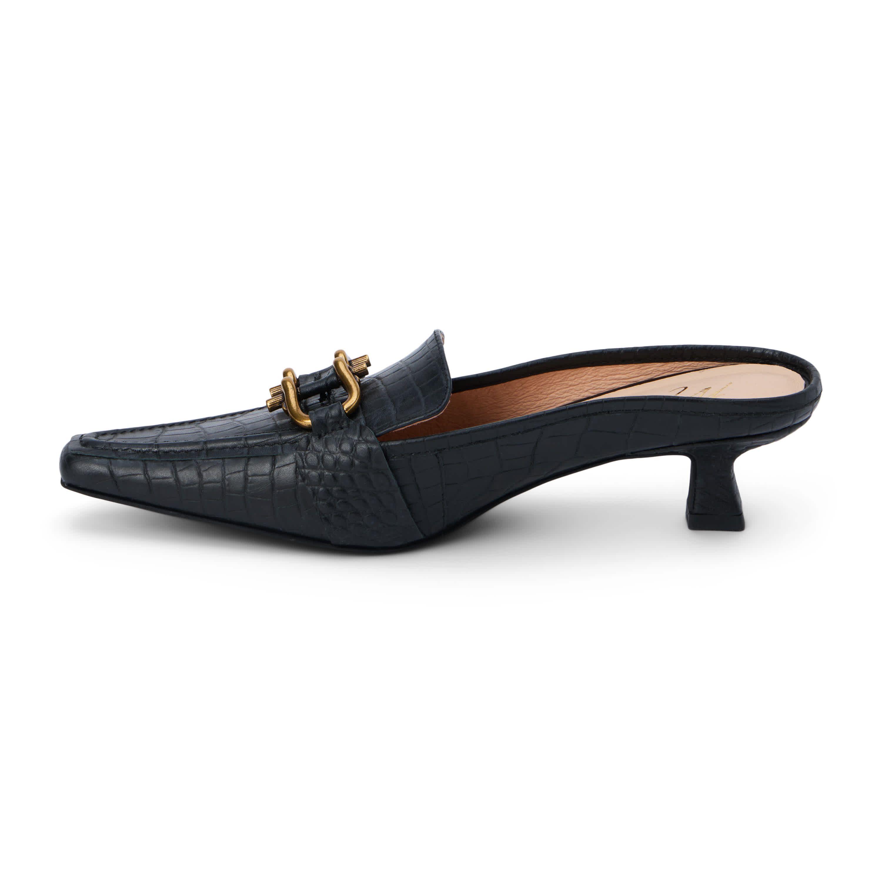 Pointed toe, kitten heel mule with hardware detail.