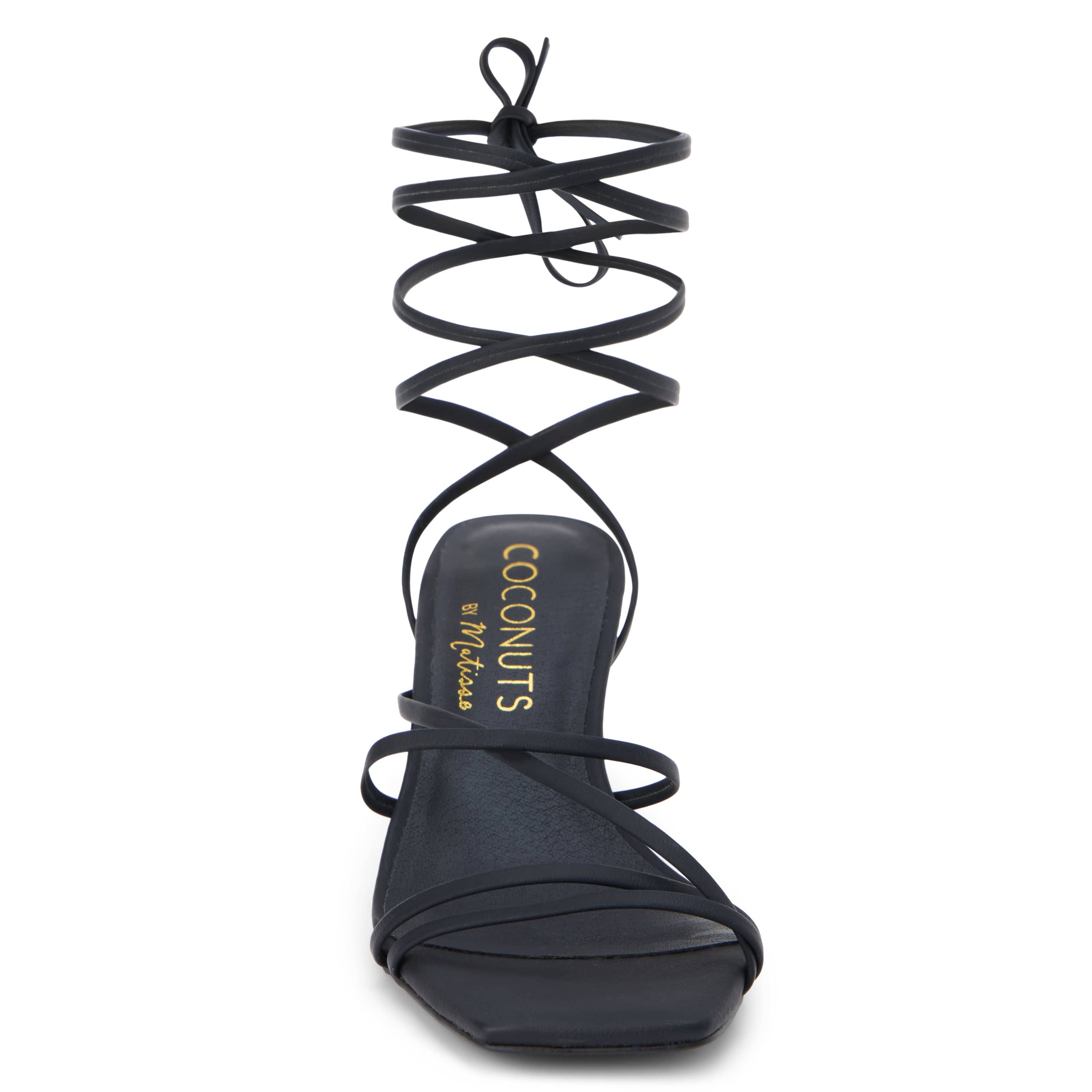 Vegan, strappy sandal with removable ankle tie.