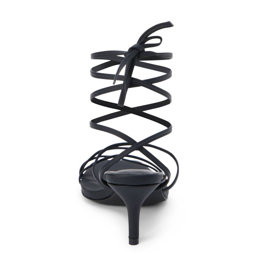 Vegan, strappy sandal with removable ankle tie.