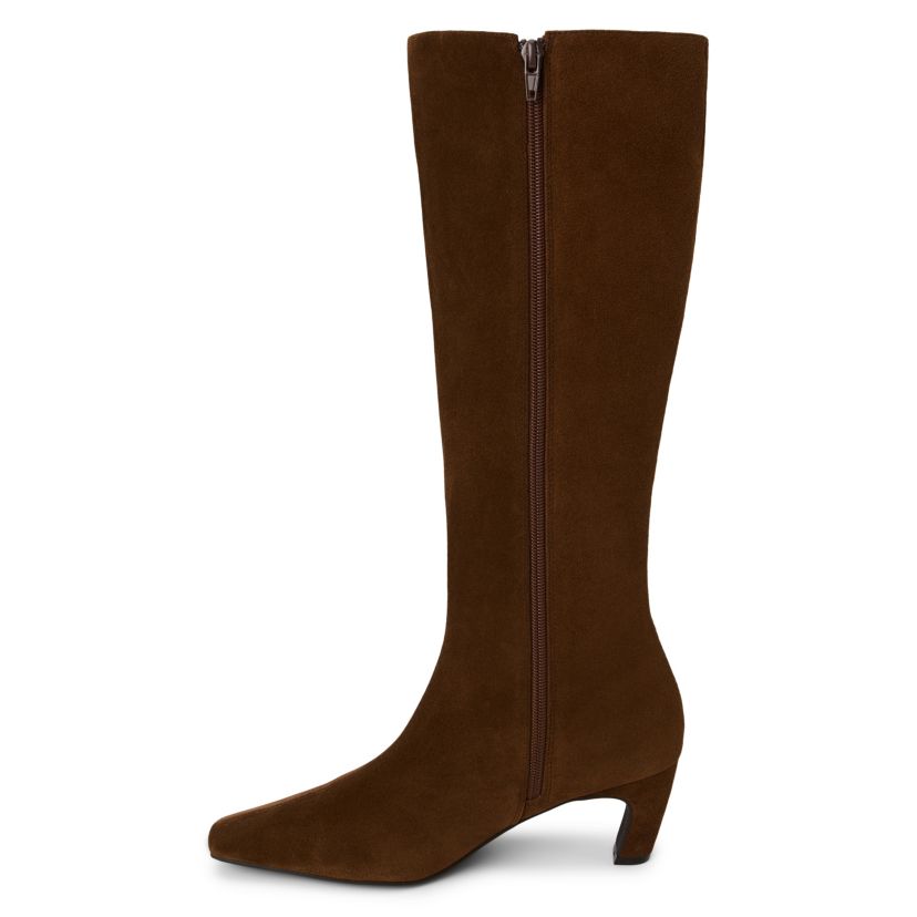Simple knee high boot with architectural heel.