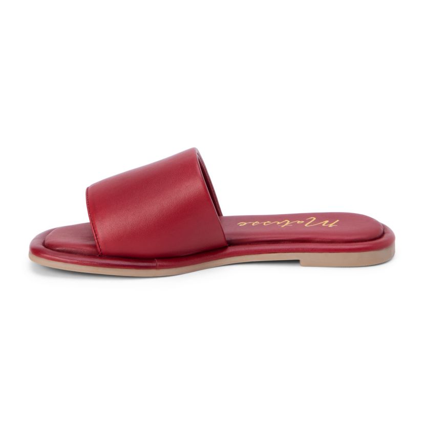 Flat sandal with puffy, one band upper.