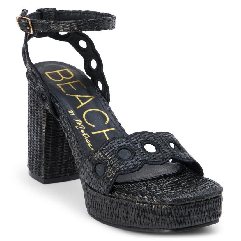 Vegan, platform heeled sandal with scallop and cut-out detail.