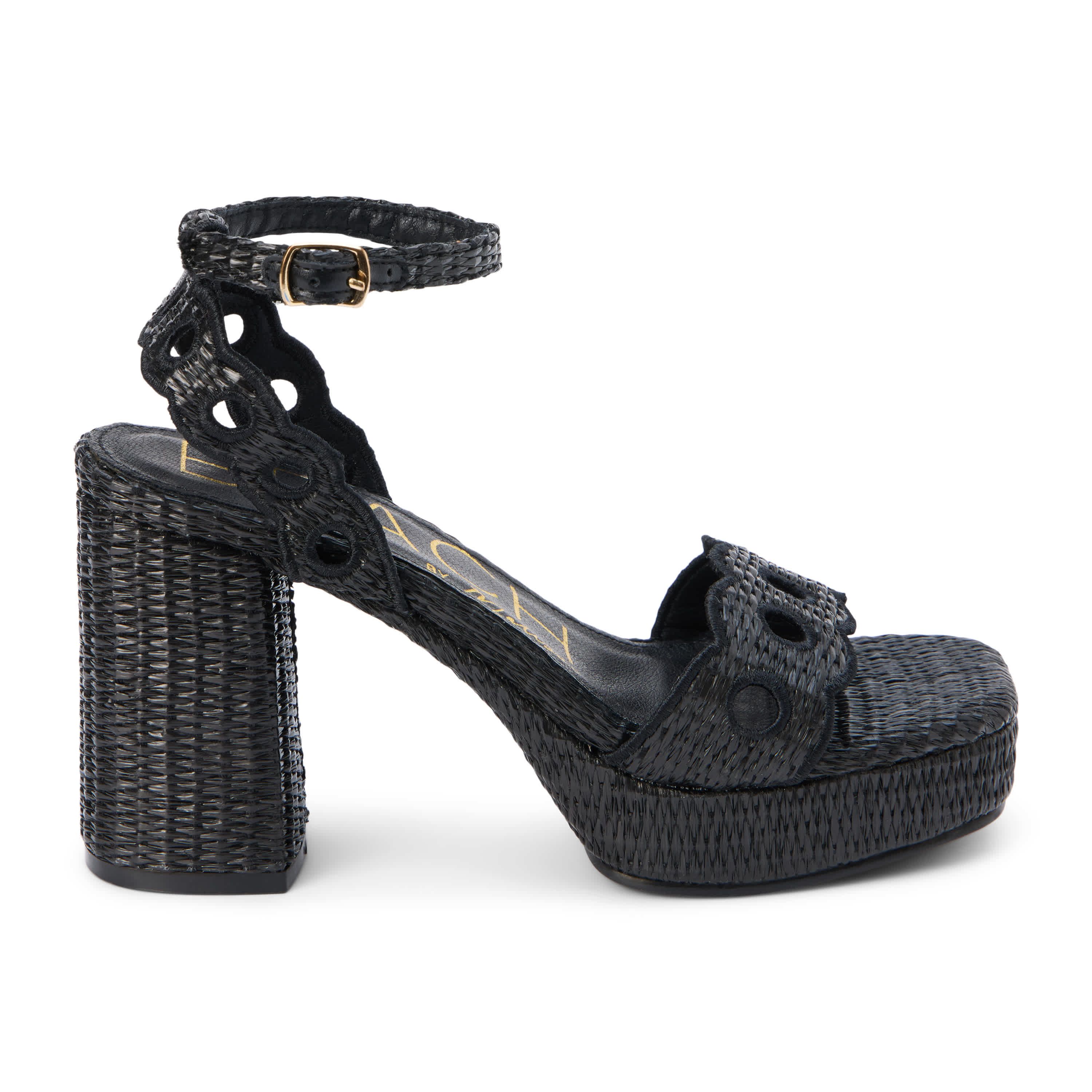 Vegan, platform heeled sandal with scallop and cut-out detail.
