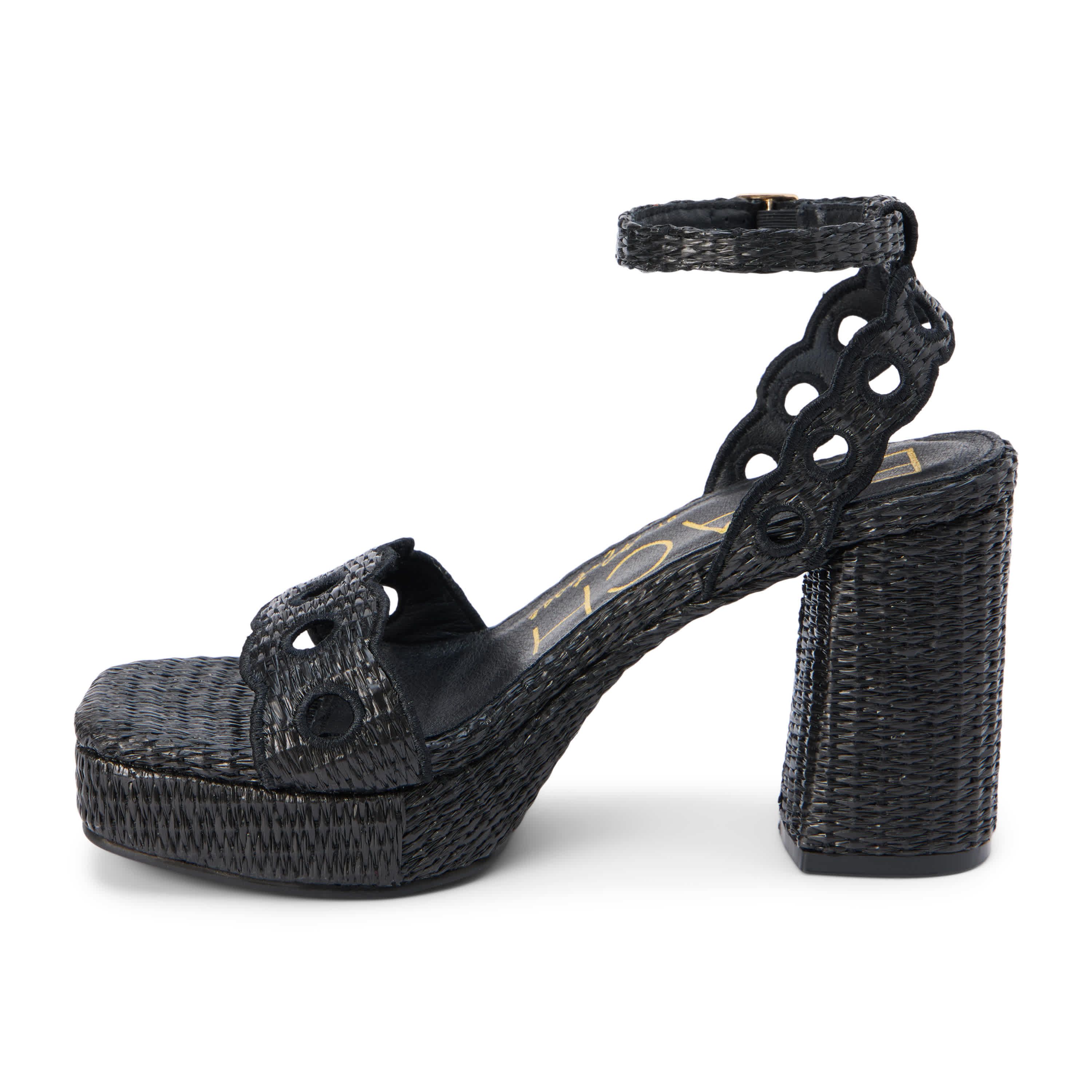 Vegan, platform heeled sandal with scallop and cut-out detail.