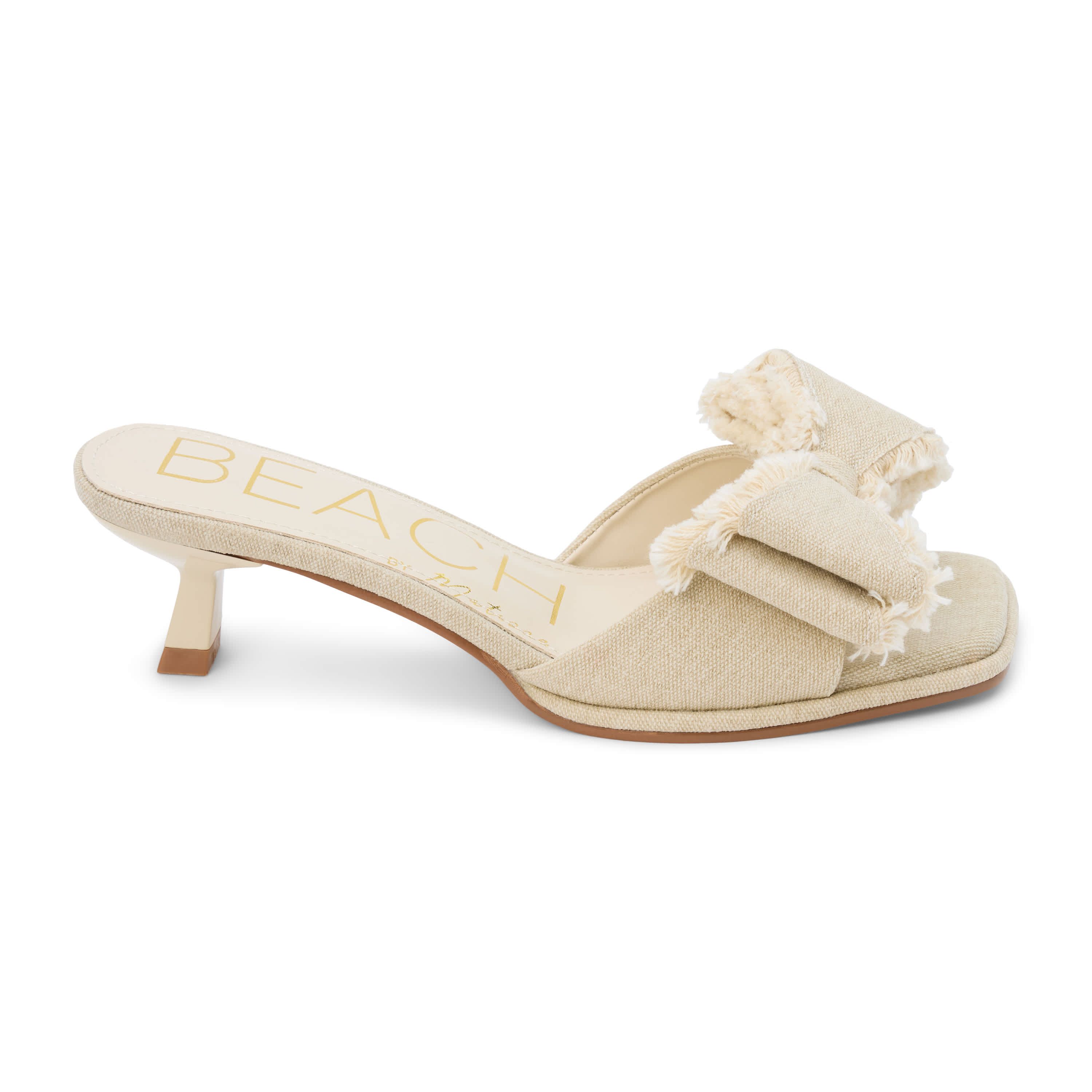 Vegan, Kitten heel heel heel sandal with bow detail.