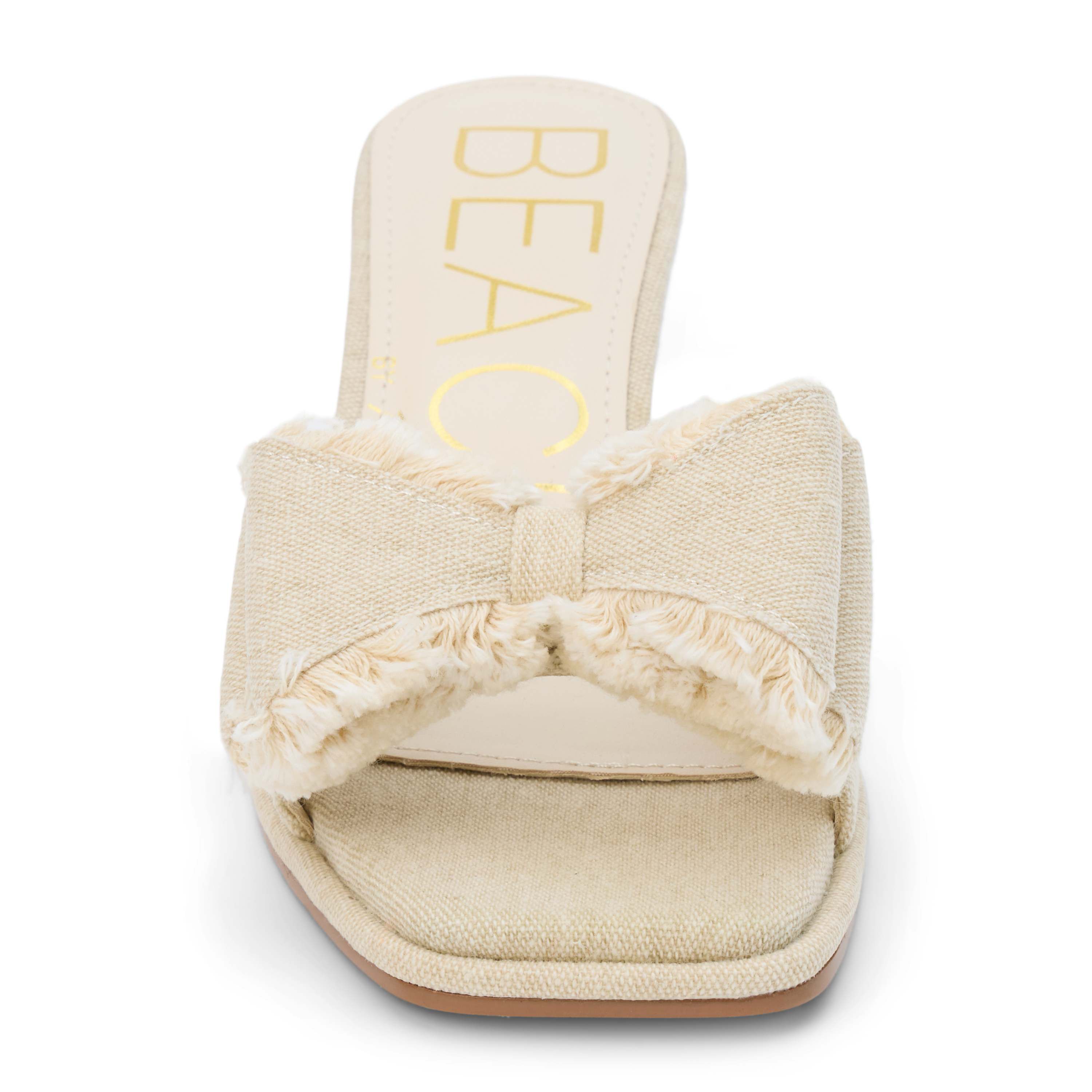 Vegan, Kitten heel heel heel sandal with bow detail.