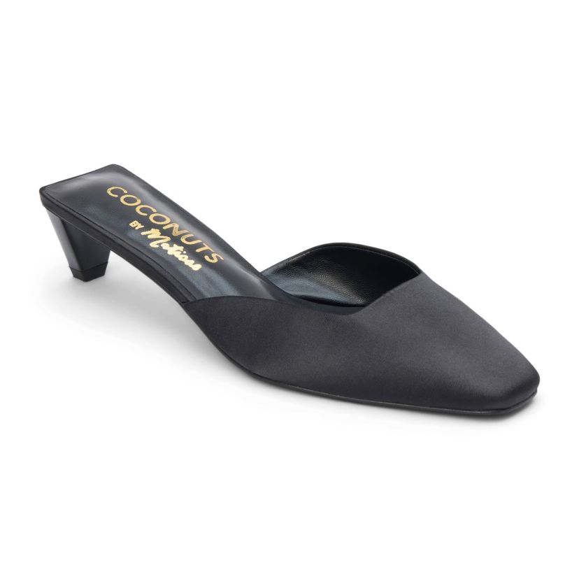 Vegan mule with elongated toe and architectural heel.