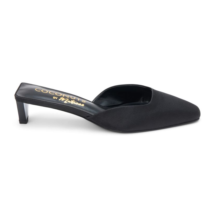 Vegan mule with elongated toe and architectural heel.