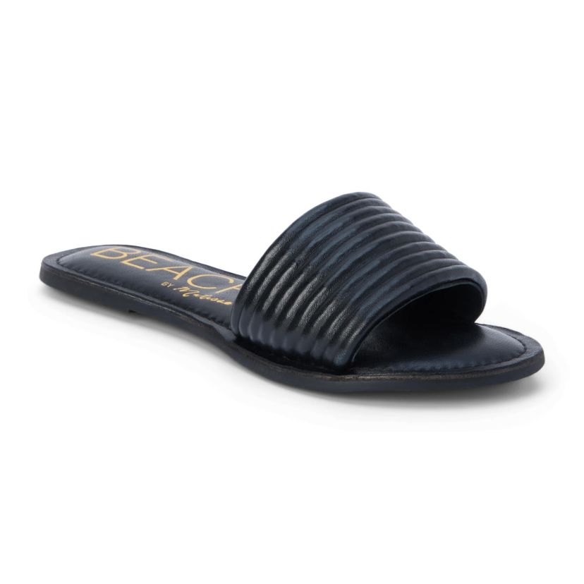 Flat one band sandal with ribbed detail.