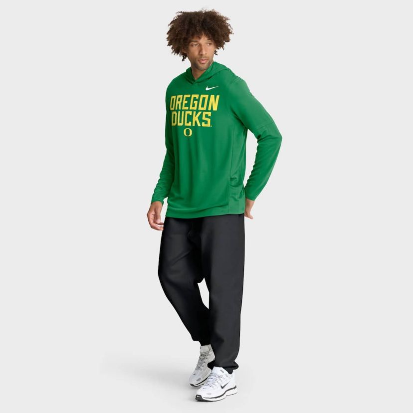 NCAA Nike Oregon Ducks 2025 Sideline Dri-FIT Long Sleeve Hoodie T-Shirt