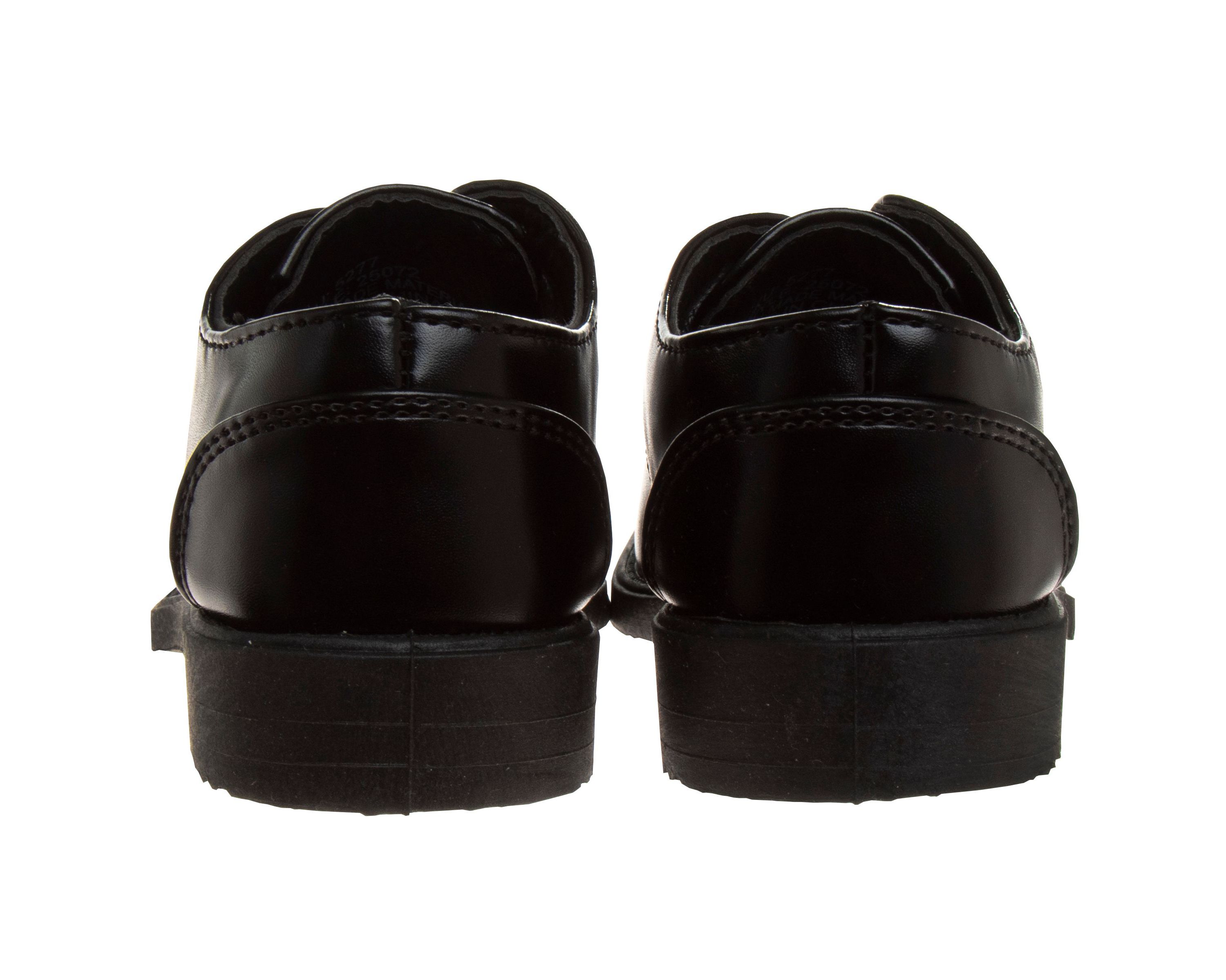 Boys dress shoes, lace-up style.