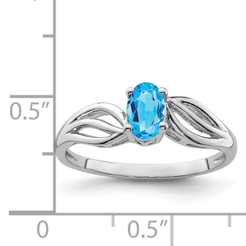 1/2 ct. t.w. Light Swiss Blue Topaz Ring in Rhodium-plated Sterling Silver