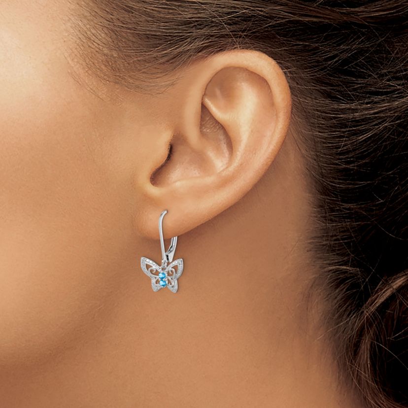 1/6 ct. t.w. Blue Topaz and Diamond Accent Earrings in Rhodium-plated Sterling Silver