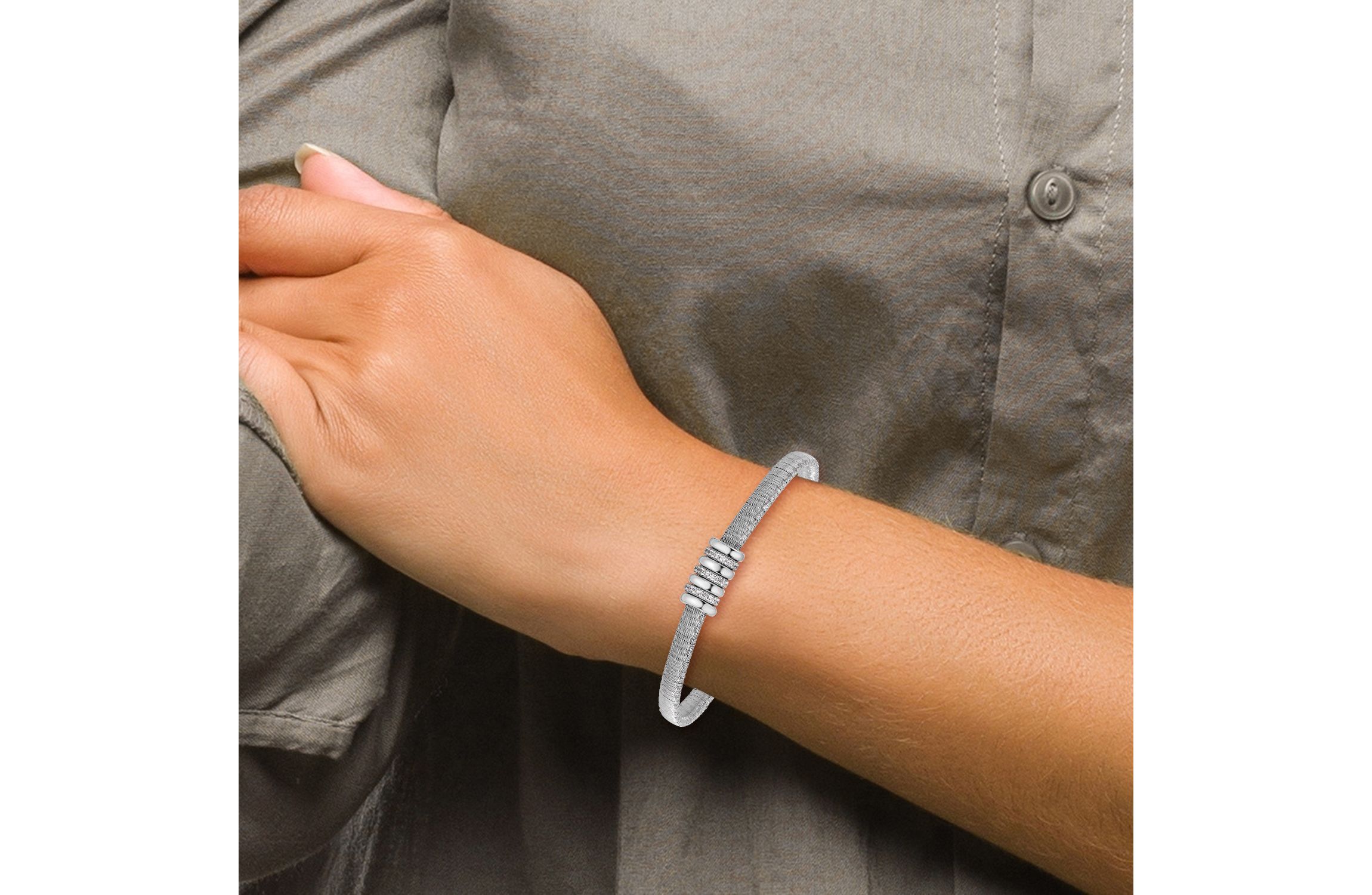 Sterling Silver Rhodium-plated Cubic Zirconia with 1-inch Safety Chain Flexible Bangle