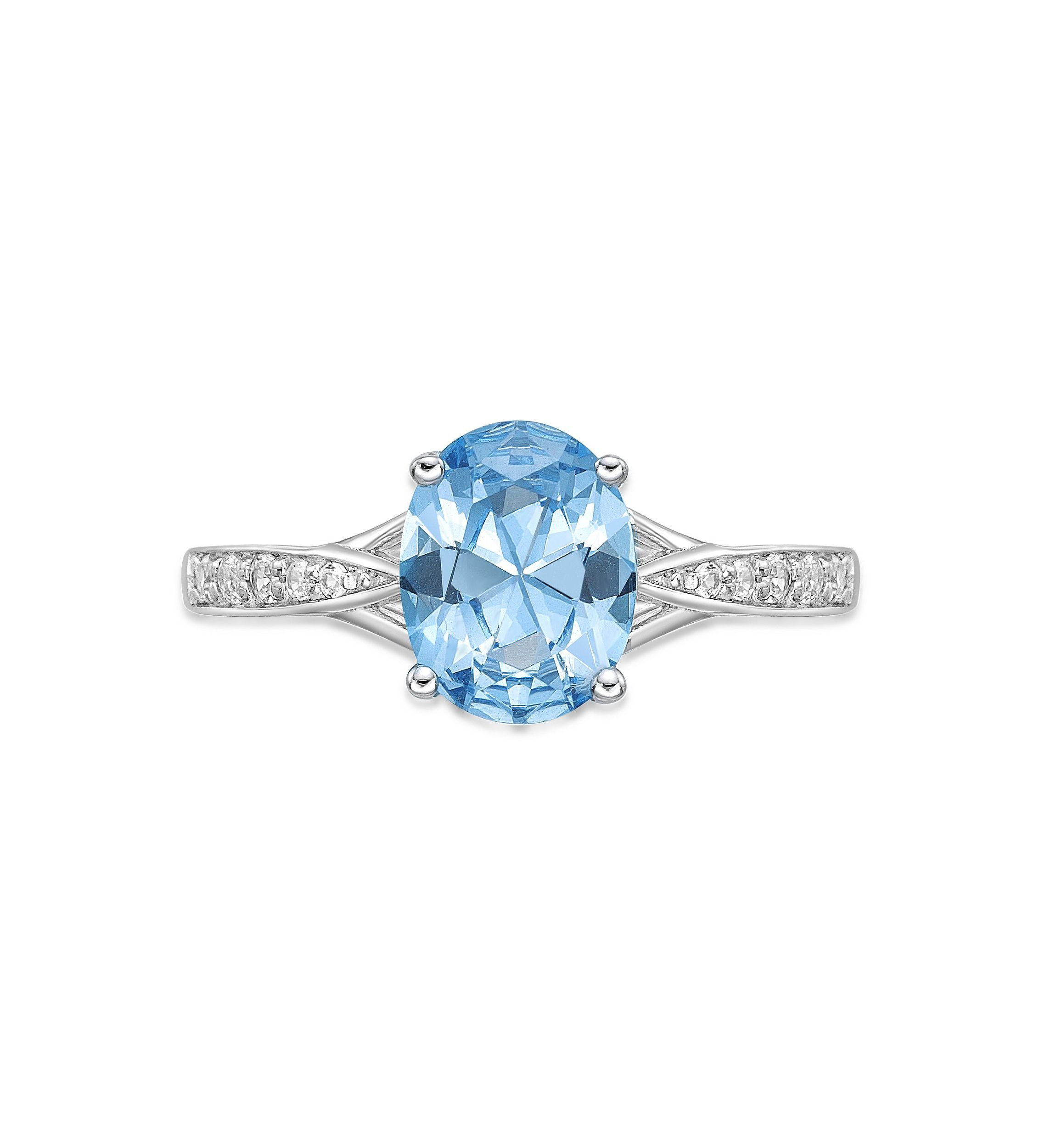 2.35 ct. t.w. Blue Topaz and White Topaz Accent Ring in Sterling Silver